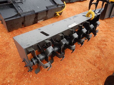 skid steer rototiller cost|rototiller attachment for skid steer.